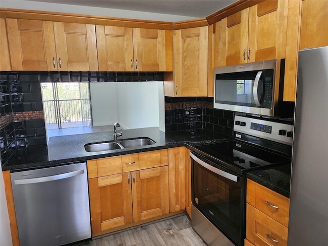 1228 S Military Trail, Unit 2121 in Deerfield Beach, FL - Building Photo - Building Photo