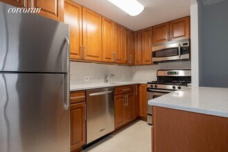 188 E 70th St-Unit -: 8D in New York, NY - Building Photo - Building Photo