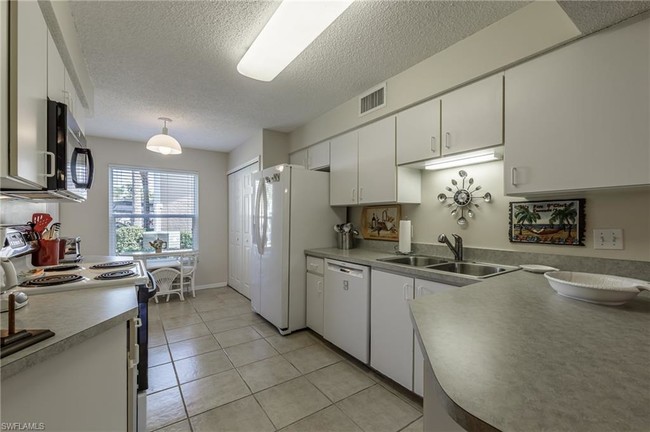 3971 Leeward Passage Ct-Unit -101 in Bonita Springs, FL - Building Photo - Building Photo