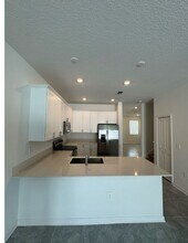 7717 Stone Crk Trl in Kissimmee, FL - Building Photo - Building Photo