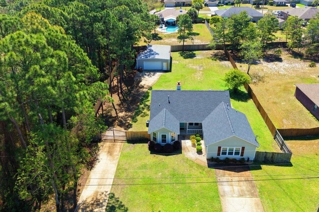 8665 El Paseo St in Navarre, FL - Building Photo - Building Photo