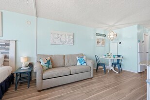 8817 S Thomas Dr, Unit SI FL6-ID1429757P in Panama City Beach, FL - Building Photo