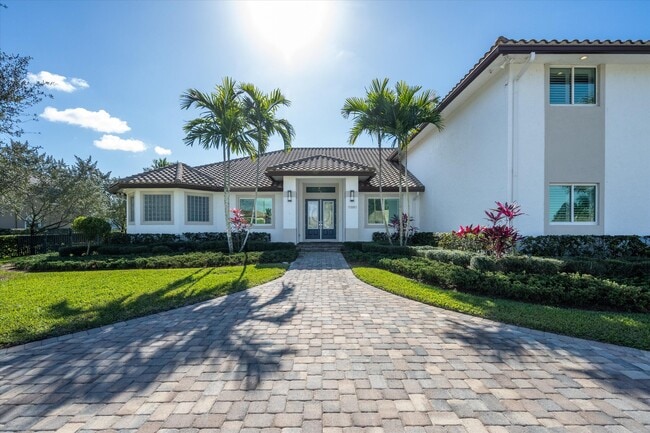 15880 Barnstormer Ct in Wellington, FL - Building Photo - Building Photo