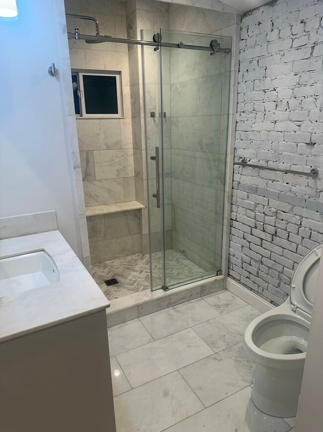 30 Downing St, Unit 2 in New York, NY - Building Photo - Building Photo