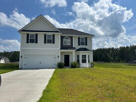 93 Loganberry Ln NE in Ludowici, GA - Building Photo