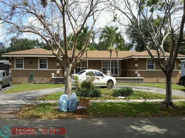 property at 7521 NW 15th St