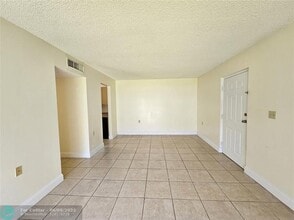 1215 Benoist Farms Rd in Royal Palm Beach, FL - Building Photo - Building Photo