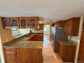 45669 Harmony Ln in Belleville, MI - Building Photo - Building Photo