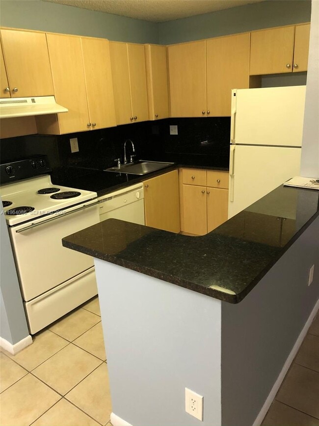 property at 7130 NW 179th St