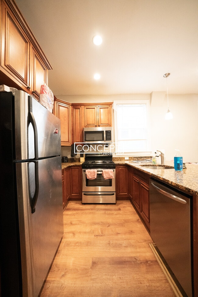 719 Parker St, Unit 2 in Boston, MA - Foto de edificio - Building Photo