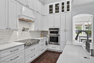 24920 Divot Dr in Bonita Springs, FL - Building Photo - Building Photo