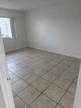 7701 Camino Real, Unit A-404 in Miami, FL - Building Photo - Building Photo