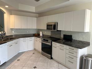 7000 Pelican Bay Blvd-Unit -A-204 in Naples, FL - Building Photo