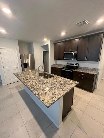 4474 Burrowing Owl Lp in St. Cloud, FL - Foto de edificio - Building Photo