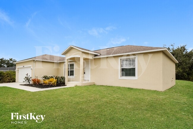 11986 Booth Ave in Port Charlotte, FL - Building Photo - Building Photo