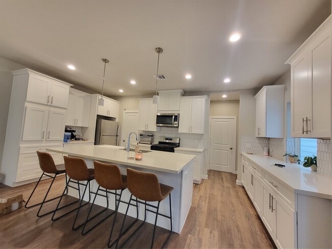 property at 6615 Ezzard Charles Ln