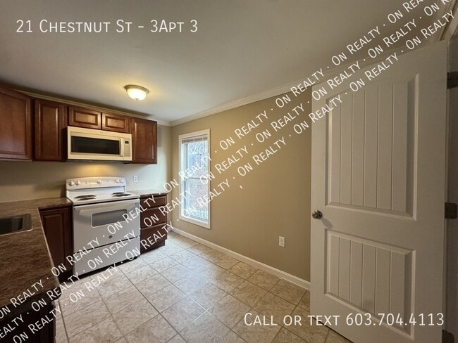 21 Chestnut St in Tilton, NH - Building Photo - Building Photo