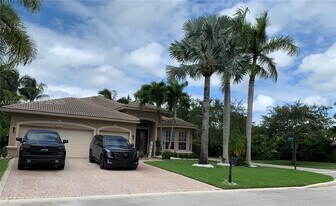 6013 NW 56th Dr in Coral Springs, FL - Building Photo