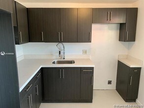 1020 Country Club Dr-Unit -106 in Margate, FL - Building Photo - Building Photo
