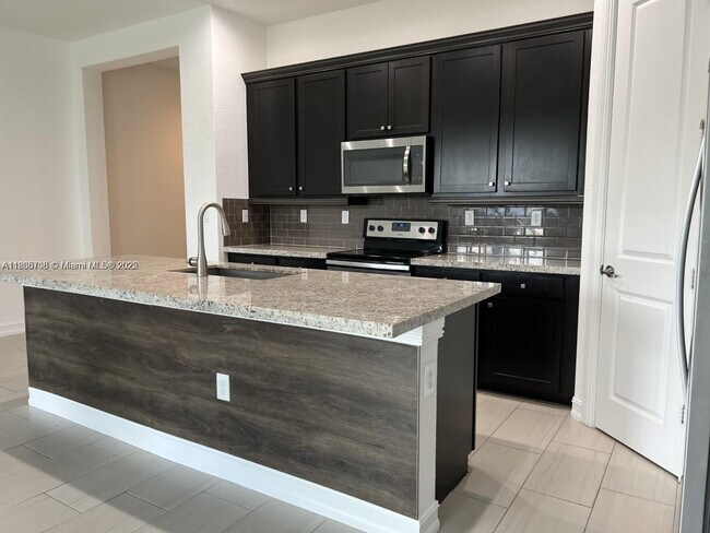 property at 11539 SW 13th Dr