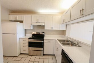 2424 W Tampa Bay Blvd, Unit L404 in Tampa, FL - Building Photo - Building Photo