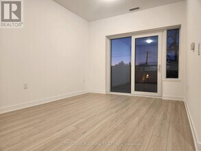 7439 Kingston Rd in Toronto, ON - Building Photo - Building Photo