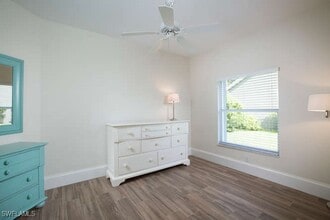 22199 Seashore Cir in Estero, FL - Building Photo - Building Photo