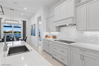 14265 Laguna Spgs Ln in Naples, FL - Building Photo - Building Photo