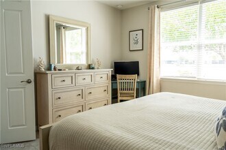 14888 Edgewater Cir in Naples, FL - Building Photo - Building Photo