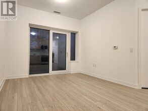 7439 Kingston Rd in Toronto, ON - Building Photo - Building Photo