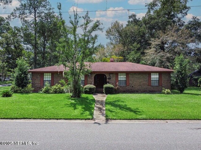 property at 6982 Madrid Ave