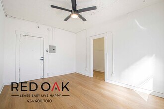 719 Heliotrope Dr, Unit 203 in Los Angeles, CA - Foto de edificio - Building Photo