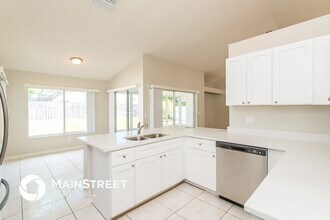 14043 Cooper Rd in Spring Hill, FL - Foto de edificio - Building Photo