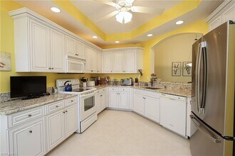 7048 Pelican Bay Blvd-Unit -C-302 in Naples, FL - Building Photo - Building Photo