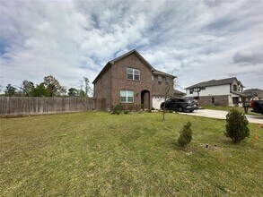 12376 N Chestnut Hls Dr in Cut And Shoot, TX - Building Photo - Building Photo
