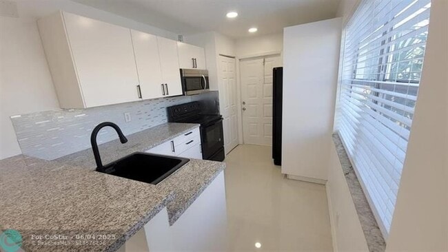 property at 831 NW 14th Way