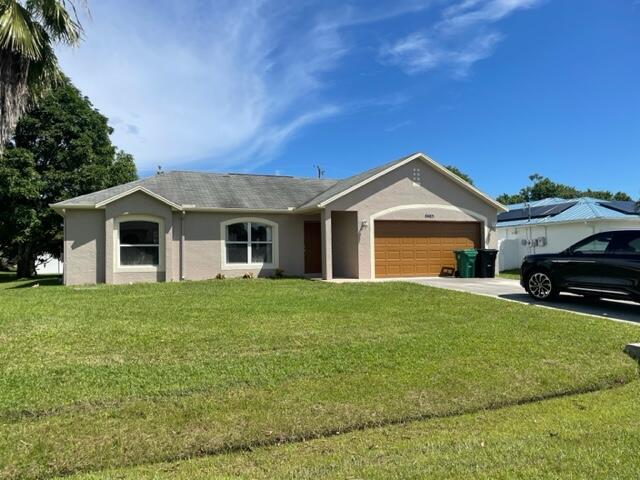 6465 NW Friendly Cir in Port St. Lucie, FL - Building Photo