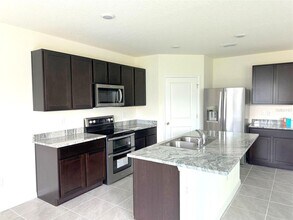 5660 Castle Cary Row in Wesley Chapel, FL - Building Photo - Building Photo