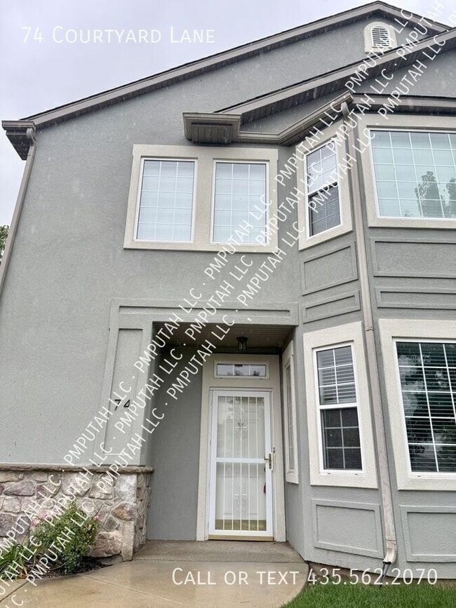 property at 74 Courtyard Ln E