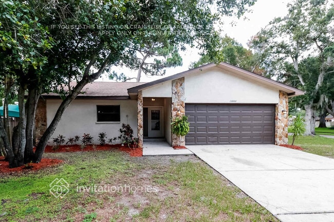 13003 Madison Ave in Largo, FL - Foto de edificio - Building Photo