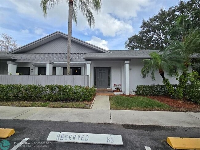 property at 4455 Carambola Cir N