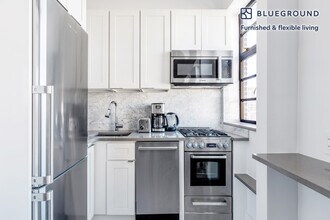 10 Sheridan Square, Unit FL8-ID553 in New York, NY - Building Photo - Building Photo