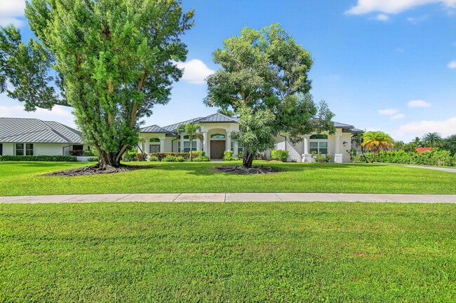 15830 Meadow Wood Dr in Wellington, FL - Building Photo - Building Photo