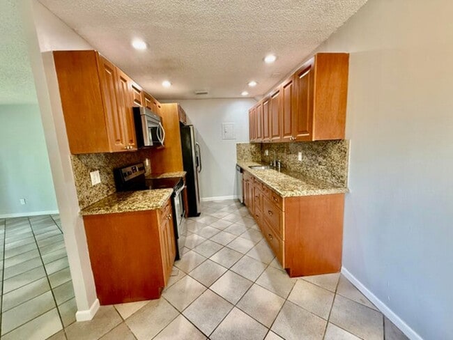 property at 3741 NW 84th Ave