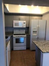 1562 SE Royal Green Cir-Unit -104 in Port St. Lucie, FL - Building Photo - Building Photo