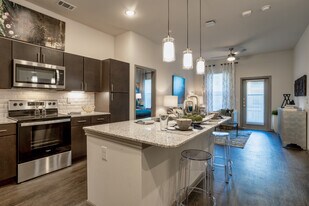 The Grand at Manor Apartments in Manor, TX - Building Photo