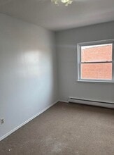 91-04-91-75 75th St, Unit 91-04 in Queens, NY - Foto de edificio - Building Photo