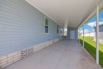 1447 Whispering Pnes Lp in Frostproof, FL - Building Photo - Building Photo