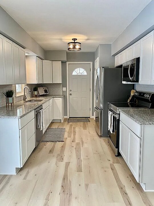 7042 Logan Ave N in Minneapolis, MN - Building Photo