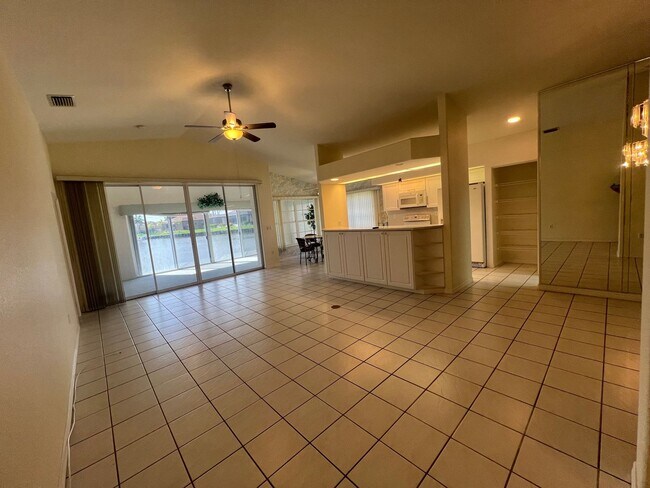 12932 SW Doug Dr in Lake Suzy, FL - Building Photo - Building Photo